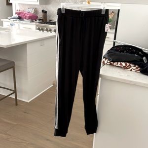 Black NWT cotton joggers with double white side stripe, elastic waist